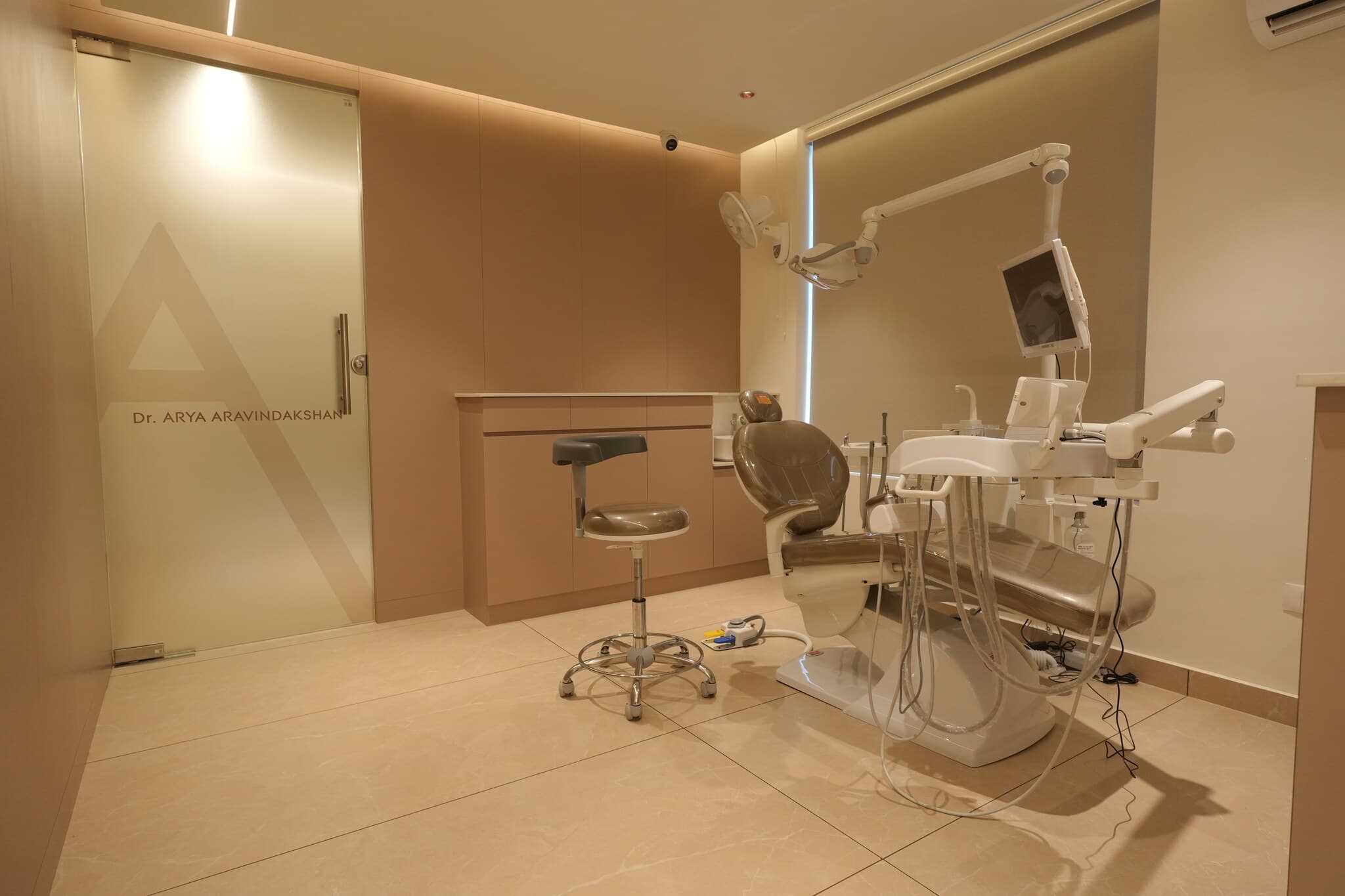 Beyond Smiles luxury dental clinic interior with warm cinematic lighting